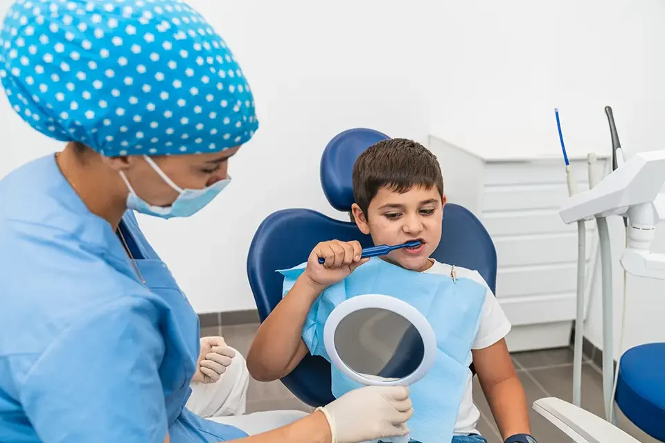 child-learning-to-brush-teeth-properly Sunshine Dentistry: The Premier Kids Dentist Near You in Richmond Hill