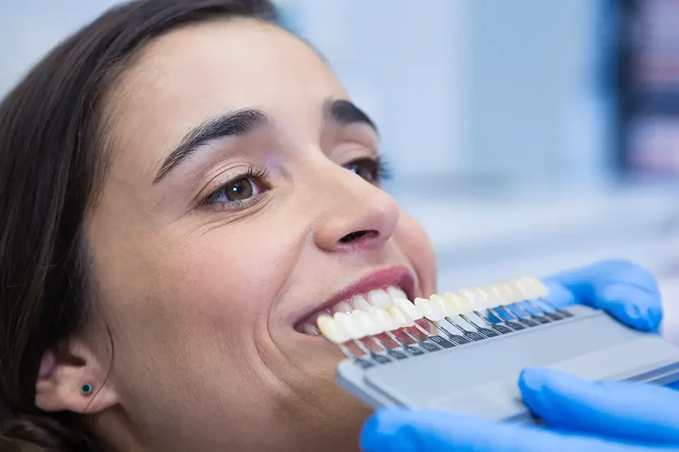 close-up-of-dentist-holding-equipment How Long Does Composite Bonding Last?