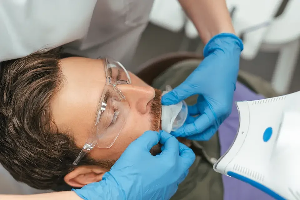cropped-view-of-dentist-in-latex-gloves What Are Amalgam Fillings Made of?