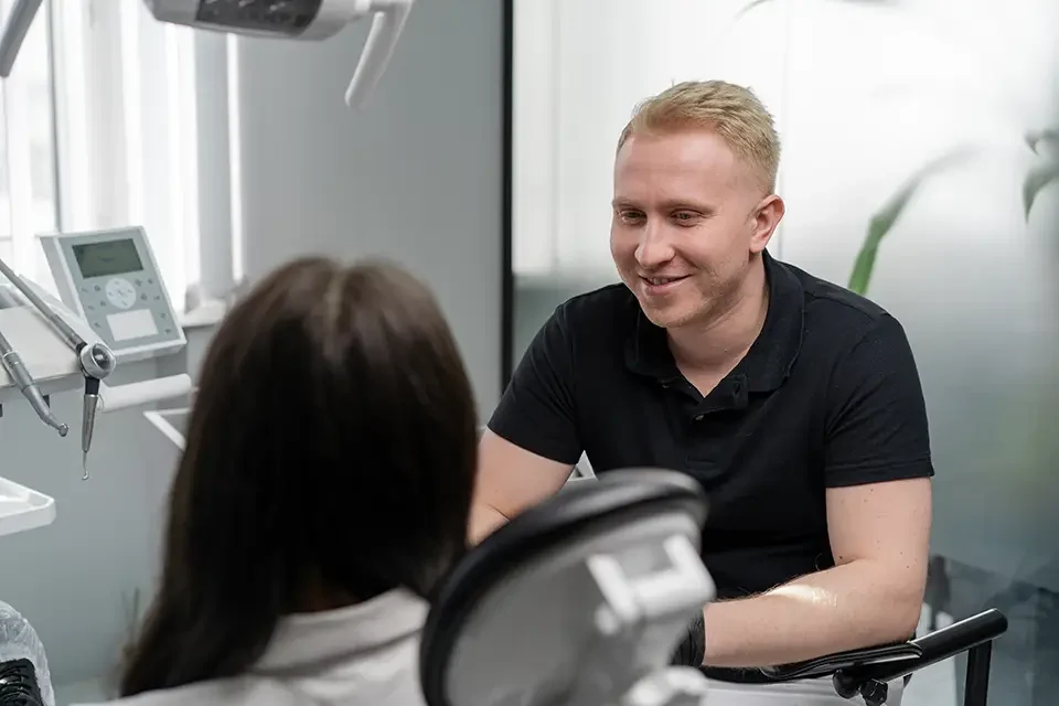 dentistry-patient-at-a-consultation-with-a-dentist What is an RCT Specialist?