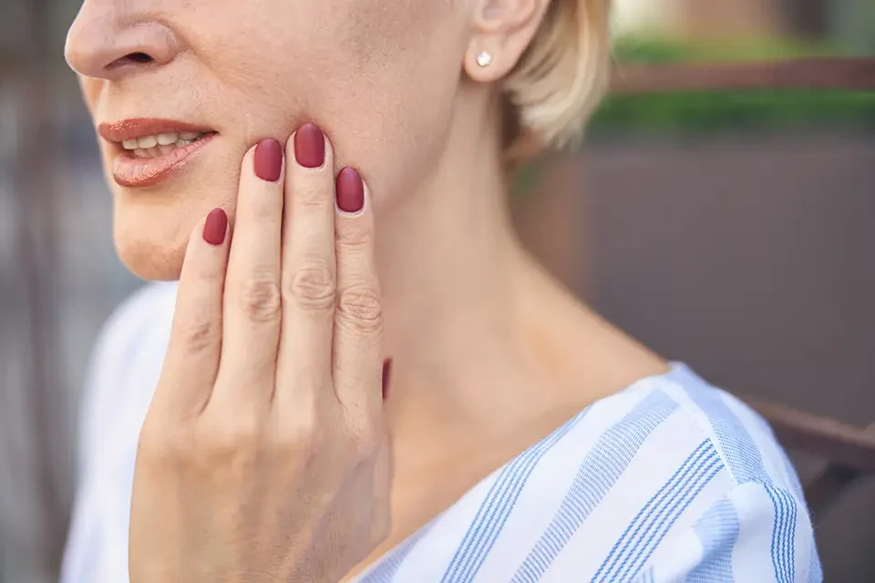 female-suffering-from-an-acute-dental-pain How to Recognize the Signs of Dental Bone Loss