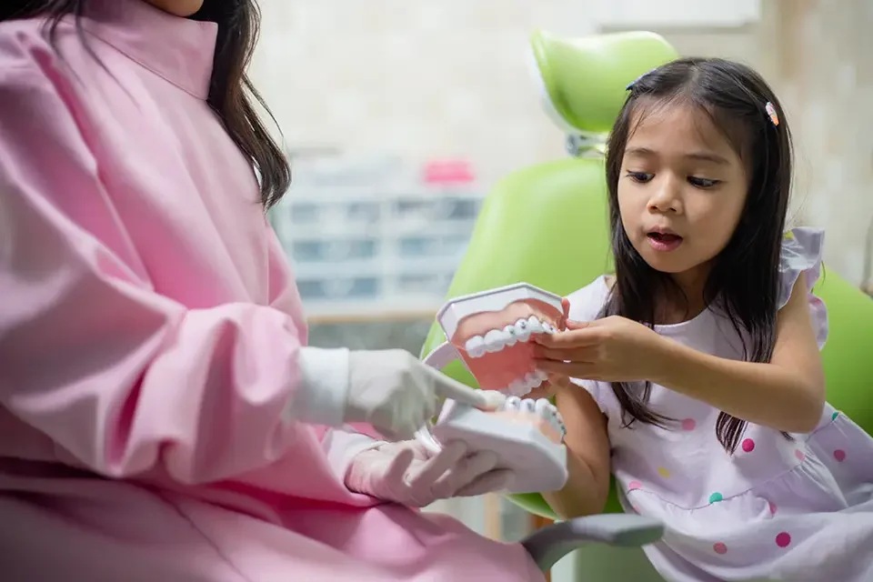 little-asian-girls-teeth-are-healthy-in-the-dental-clinic Why Is Pediatric Dental Care Important?