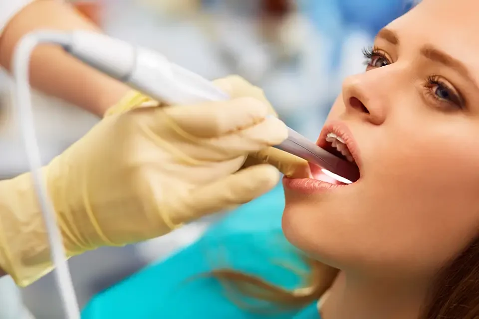 overview-of-dental-caries-prevention-woman How to Address Decay Beneath Crowns