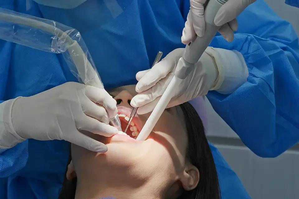 woman-undergo-dental-scaling-treatment Typical Bone Graft Dental Cost in Richmond Hill, Ontario