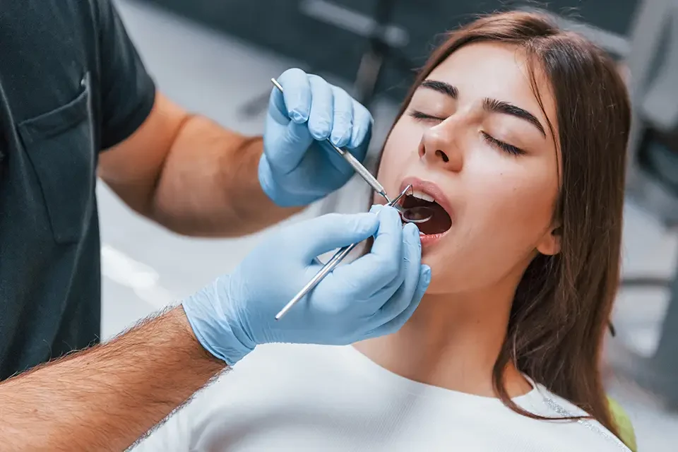 young-adult-woman-have-a-visit-in-the-dentist-clinc Dental Necrosis Diagnosis: How We Make a Definitive Diagnosis